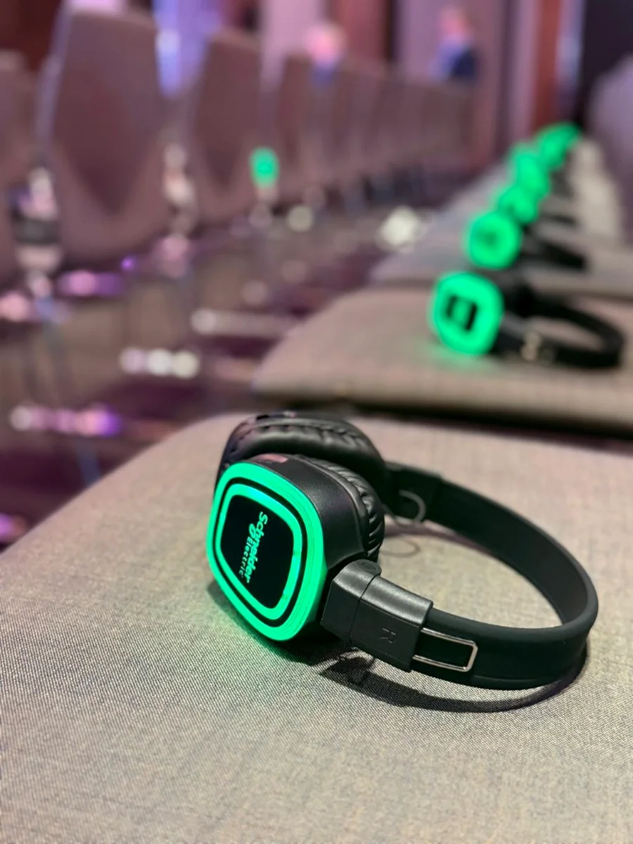 GoSilent headsets placed on conference chairs before an event